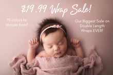 Load image into Gallery viewer, An infant wrapped in a pink cheesecloth baby wrap with a decorative headband, advertised during a sale.