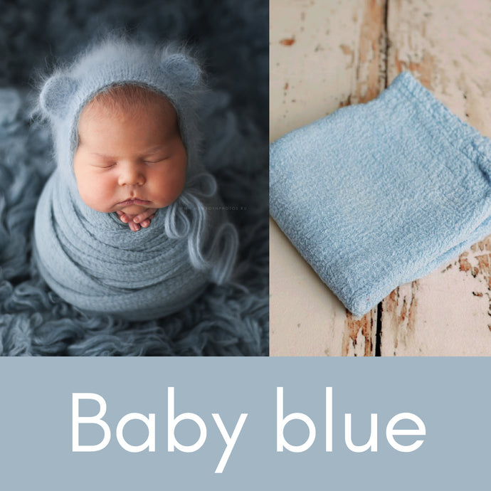 a collage of photos of a baby with a blue blanket